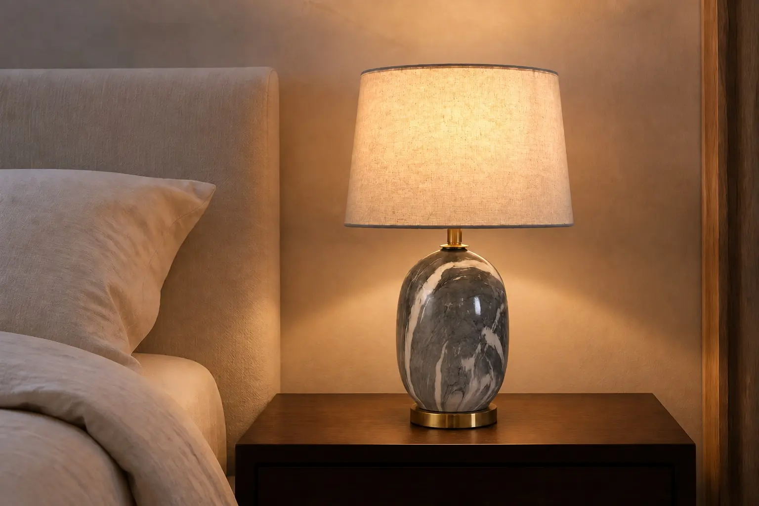 Lance Bedside Lamp with its original oval marble-look base in a warm bedroom